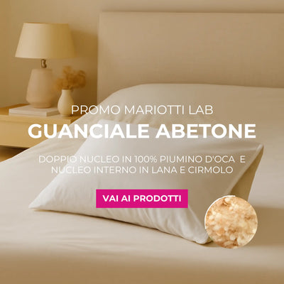 Cuscino 100% piuma d'oca con nucleo interno in lana e cirmolo, colore bianco.